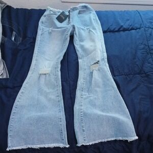 Sky Blue Flare Jeans with Distressed Details